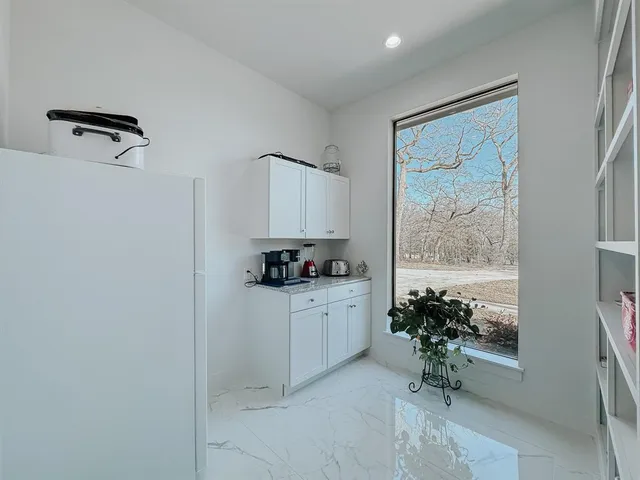 a room with furniture and a window