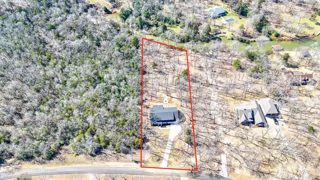 a picture of street with a building in the background