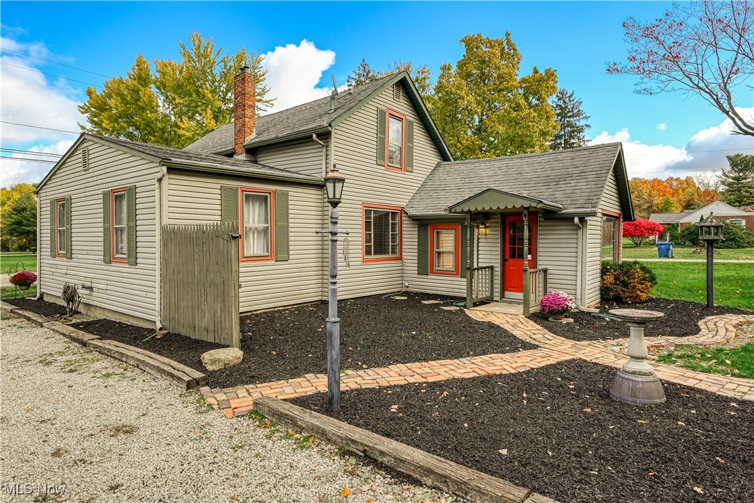 208 East Comet Road Clinton, OH 44216 - Photo 7 of 45 neat and tidy with lots of landscaping opportunities at the rear entrance.