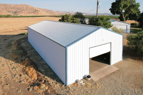 a view of a terrace with a wooden fence