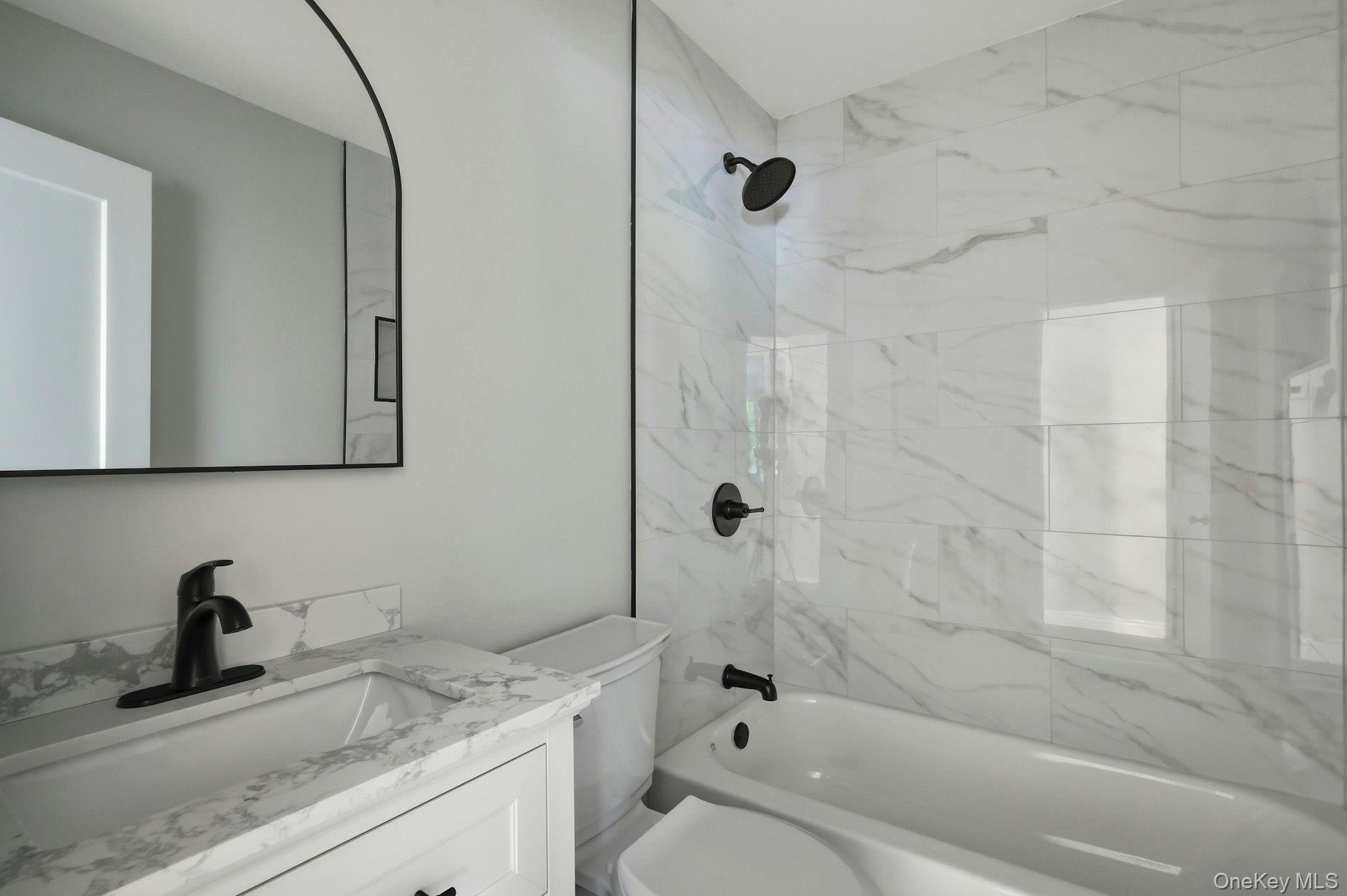 101 Rustic Road Centereach, NY 11720 - Photo 29 of 42 a bathroom with a granite countertop sink toilet and shower