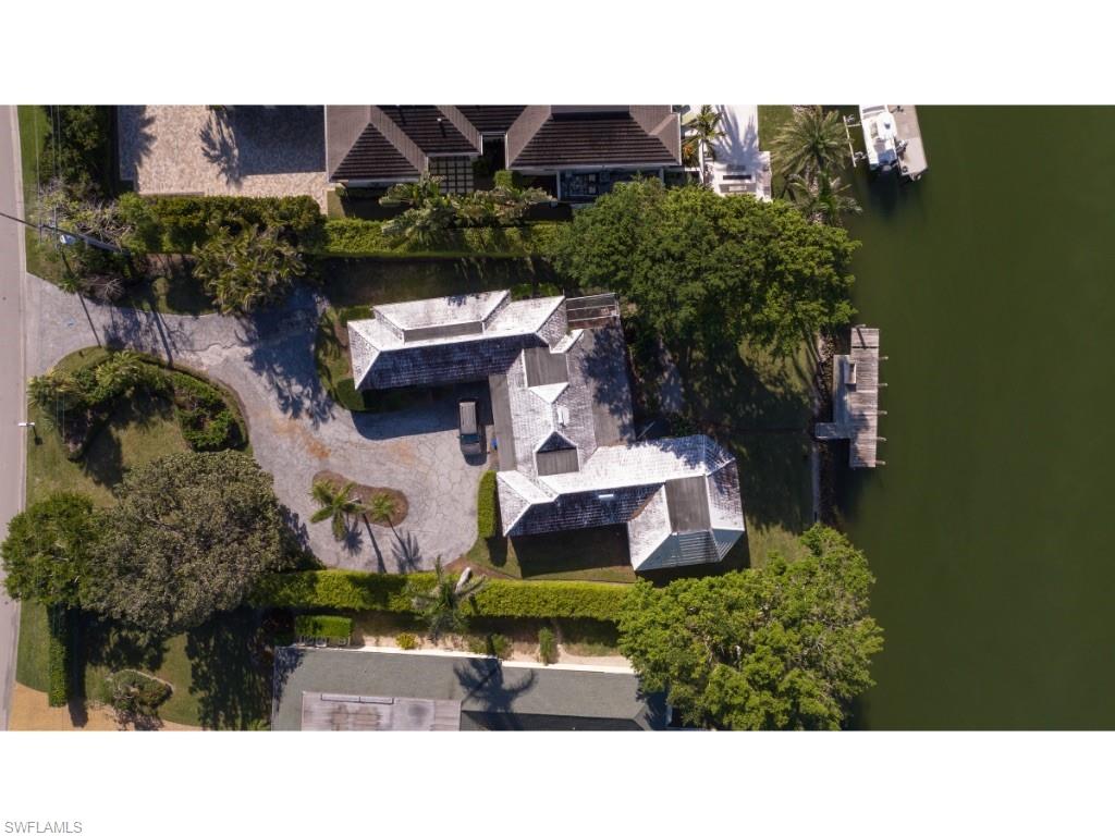 3440 Rum Row Naples, FL 34102 - Photo 2 of 3 a aerial view of a house