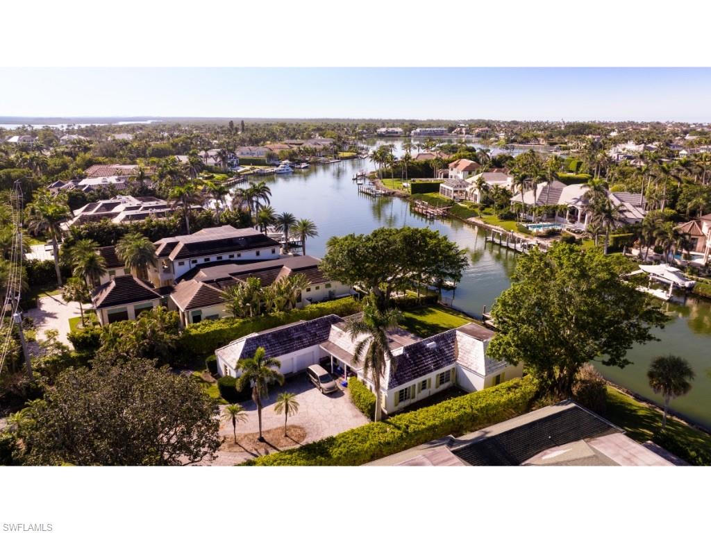 3440 Rum Row Naples, FL 34102 - Photo 3 of 3 a view of a lake