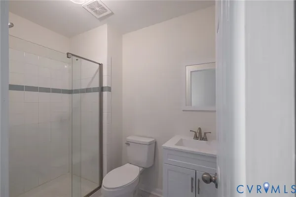 a bathroom with a bathtub and window