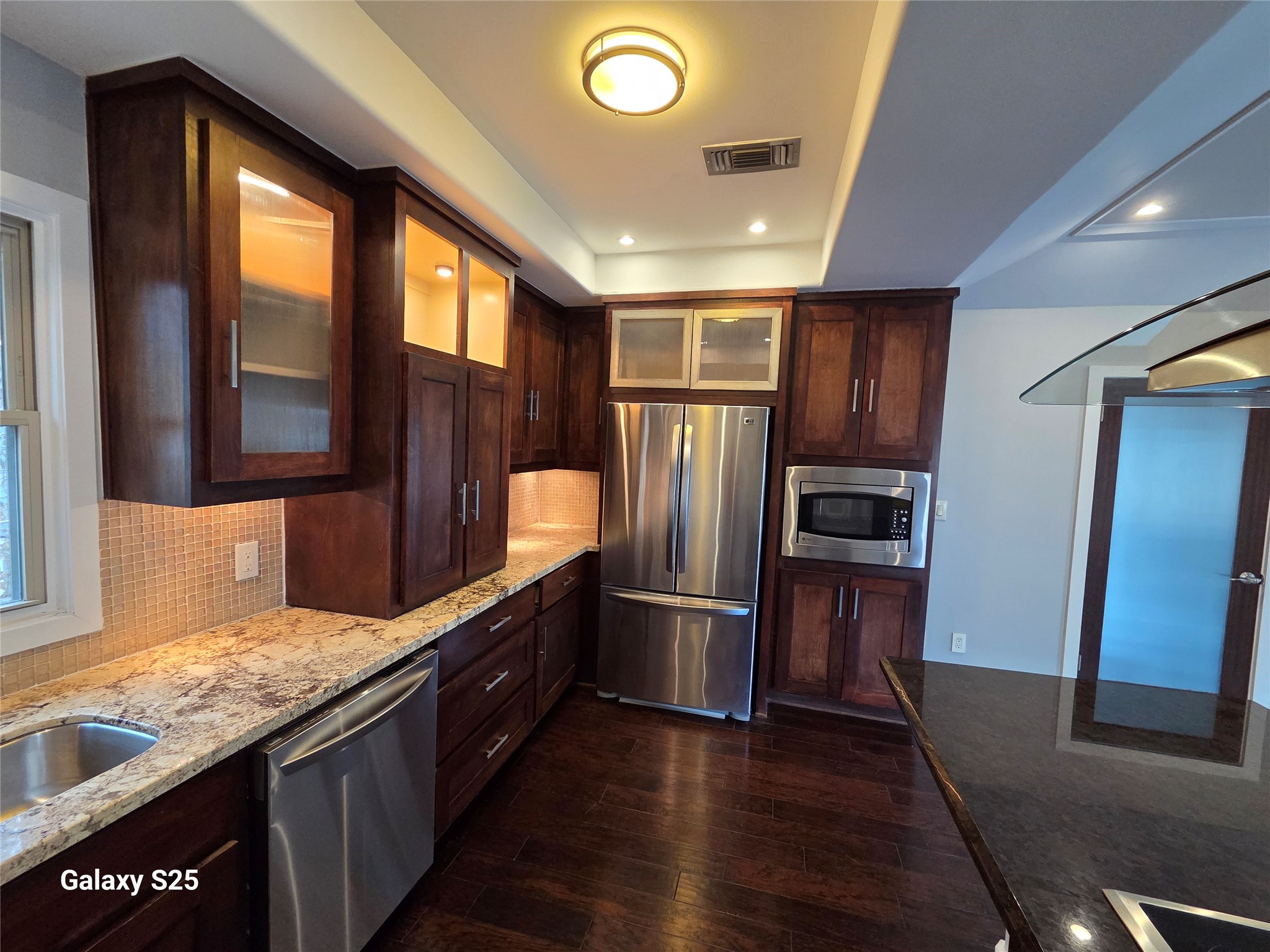 102 East 5th Street Houston, TX 77007 - Photo 17 of 44 Dishwasher, Refrigerator, and Microwave- Stainless Steel Appliances