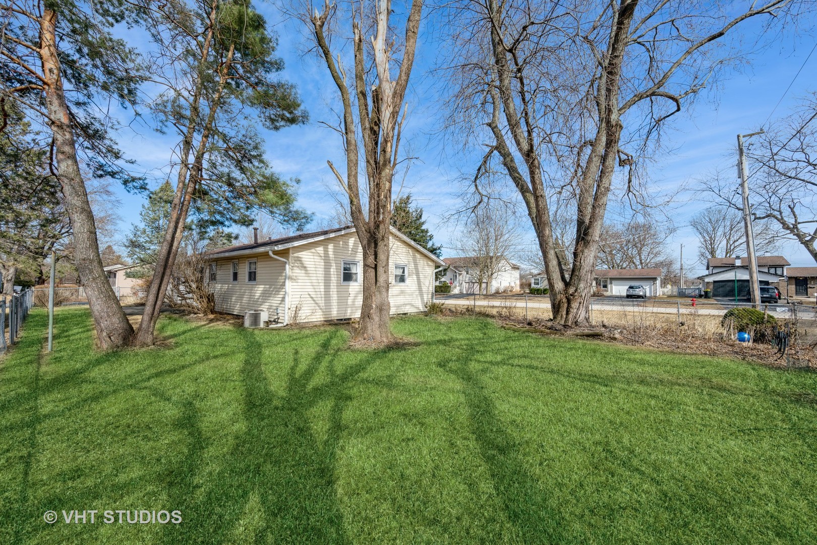 214 North School Street Cary, IL 60013 - Photo 10 of 11 a view of backyard with tree