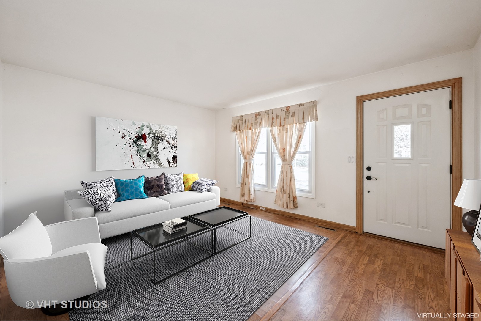 214 North School Street Cary, IL 60013 - Photo 2 of 11 a living room with furniture and wooden floor