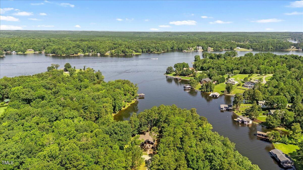 424 Roy Carver Road Semora, NC 27343 - Photo 10 of 68 a view of a lake with a lake