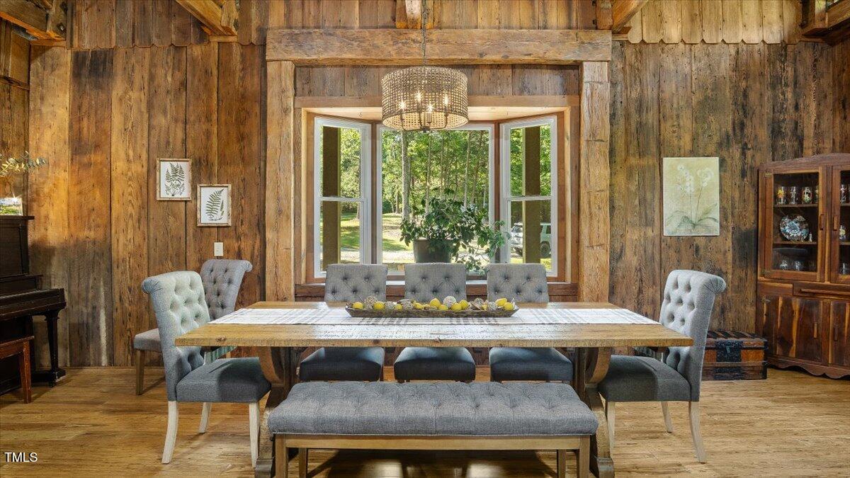 424 Roy Carver Road Semora, NC 27343 - Photo 22 of 68 a view of a dining room with furniture window and outside view