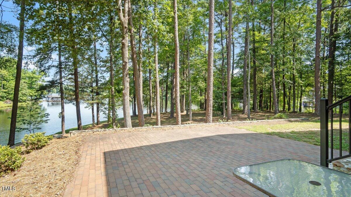 424 Roy Carver Road Semora, NC 27343 - Photo 4 of 68 a view of a house with backyard and trees