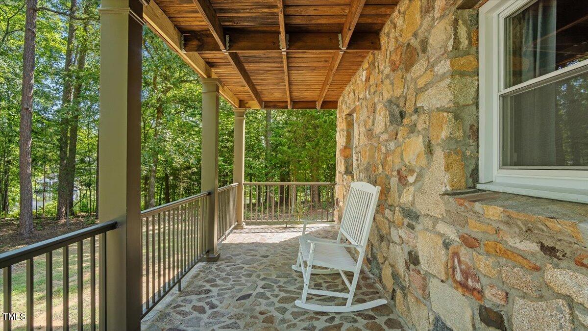 424 Roy Carver Road Semora, NC 27343 - Photo 62 of 68 a view of a chair and table in the balcony