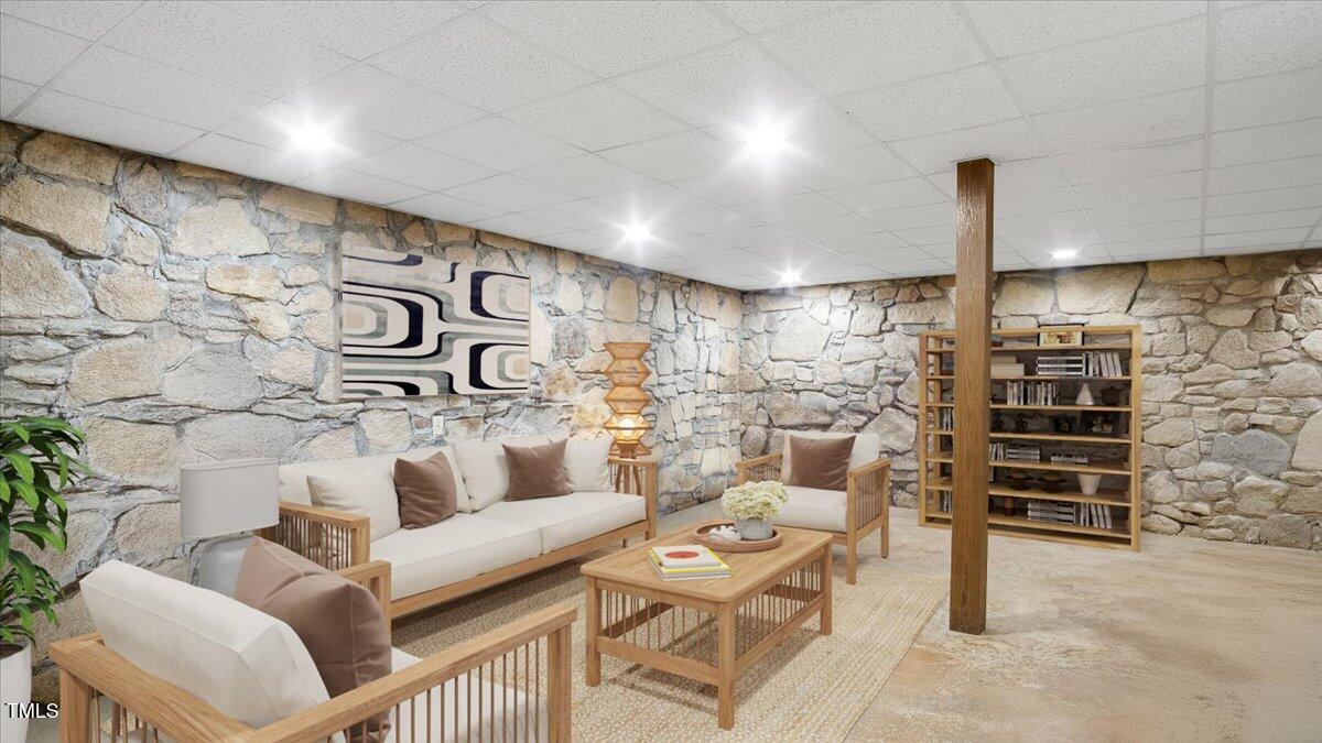 424 Roy Carver Road Semora, NC 27343 - Photo 66 of 68 a living room with furniture and wooden floor