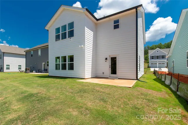 a front view of house with yard