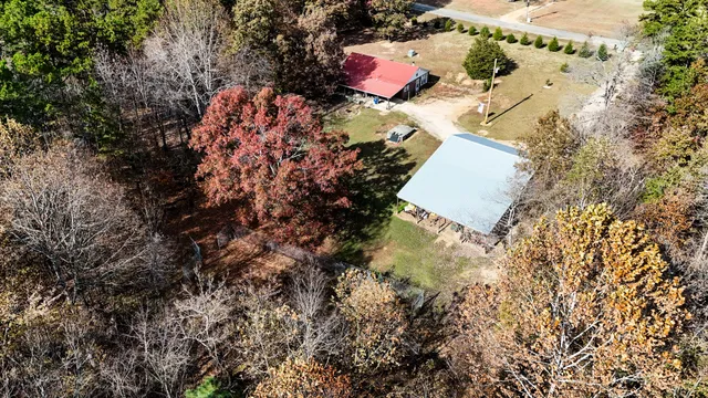 an aerial view of residential house with outdoor space