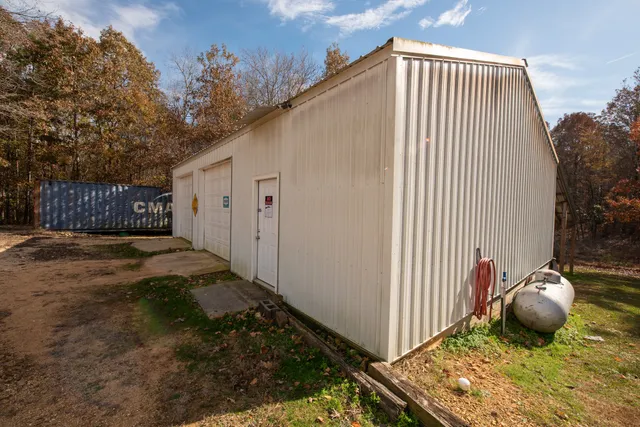 a view of a road with a building in the background