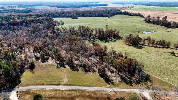 a view of a houses covered with snow