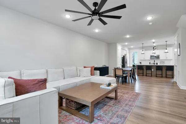 a living room with furniture and a table