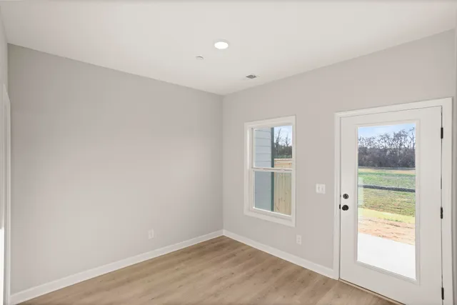 an empty room with windows