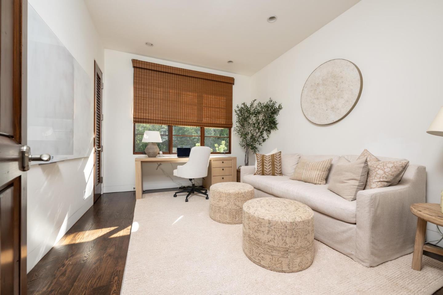 1036 Los Trancos Road Portola Valley, CA 94028 - Photo 18 of 33 a living room with furniture a large window and a potted plant