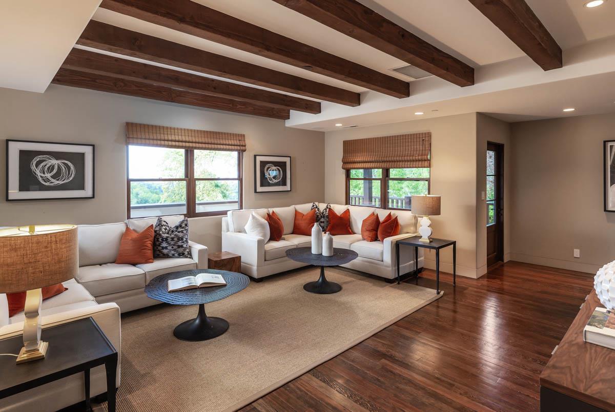 1036 Los Trancos Road Portola Valley, CA 94028 - Photo 19 of 33 a living room with furniture and wooden floor