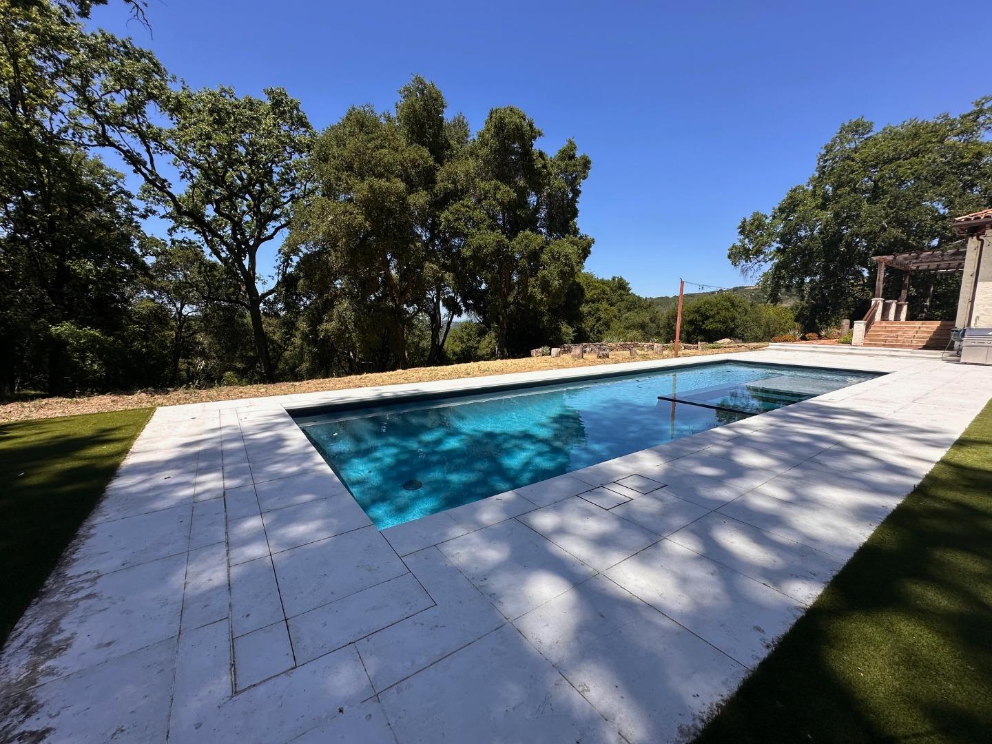 1036 Los Trancos Road Portola Valley, CA 94028 - Photo 25 of 33 a view of swimming pool with a yard