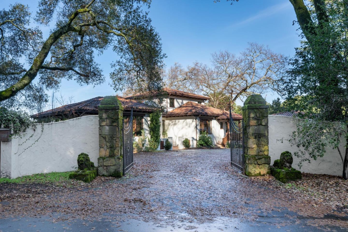 1036 Los Trancos Road Portola Valley, CA 94028 - Photo 32 of 33 a view of a house with a backyard and tree