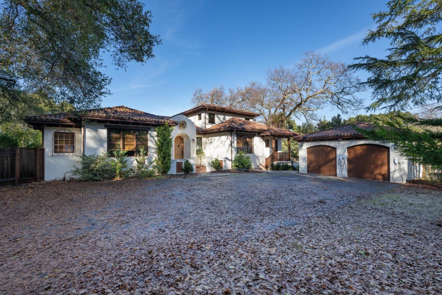 1036 Los Trancos Road Portola Valley, CA 94028 - Photo 33 of 33 a view of a house with a yard and large tree
