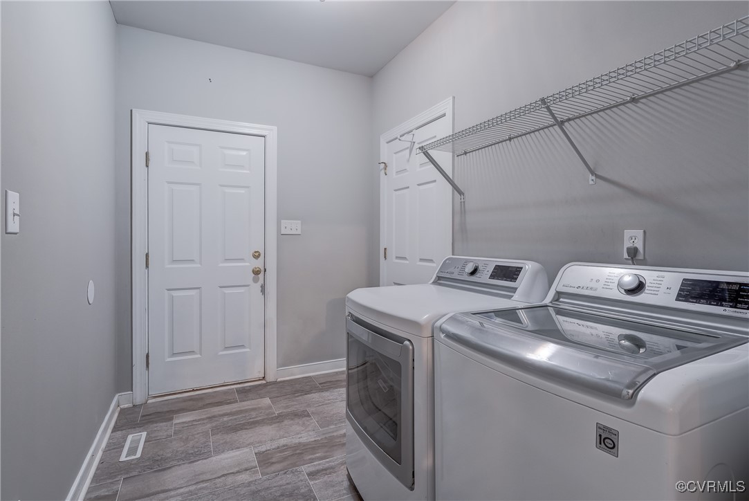 5501 Pine Needles Terrace Providence Forge, VA 23140 - Photo 27 of 50 a utility room with dryer and washer