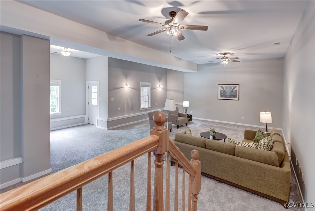 5501 Pine Needles Terrace Providence Forge, VA 23140 - Photo 34 of 50 a living room with furniture and a chandelier