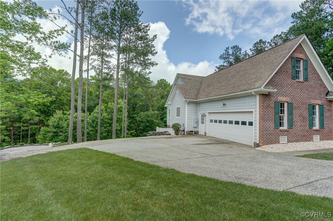 5501 Pine Needles Terrace Providence Forge, VA 23140 - Photo 40 of 50 a view of a house with a yard and large tree