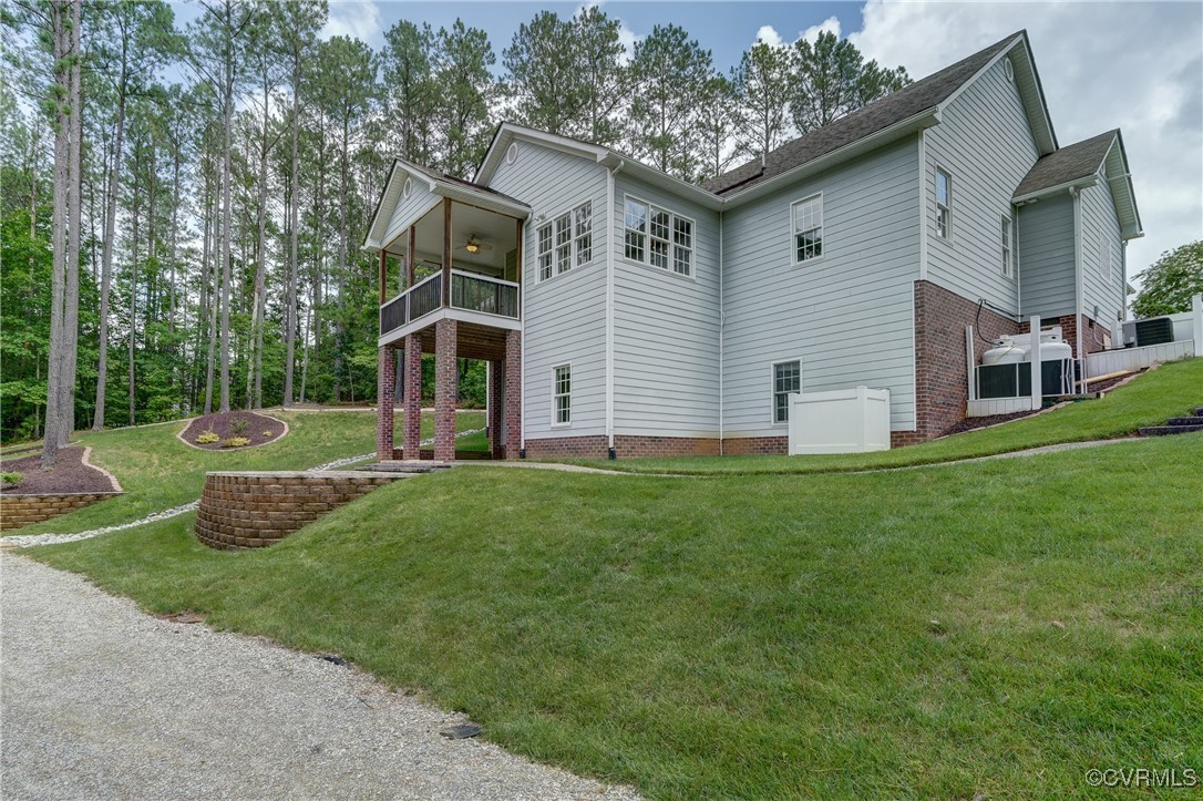 5501 Pine Needles Terrace Providence Forge, VA 23140 - Photo 41 of 50 a front view of house with yard and green space