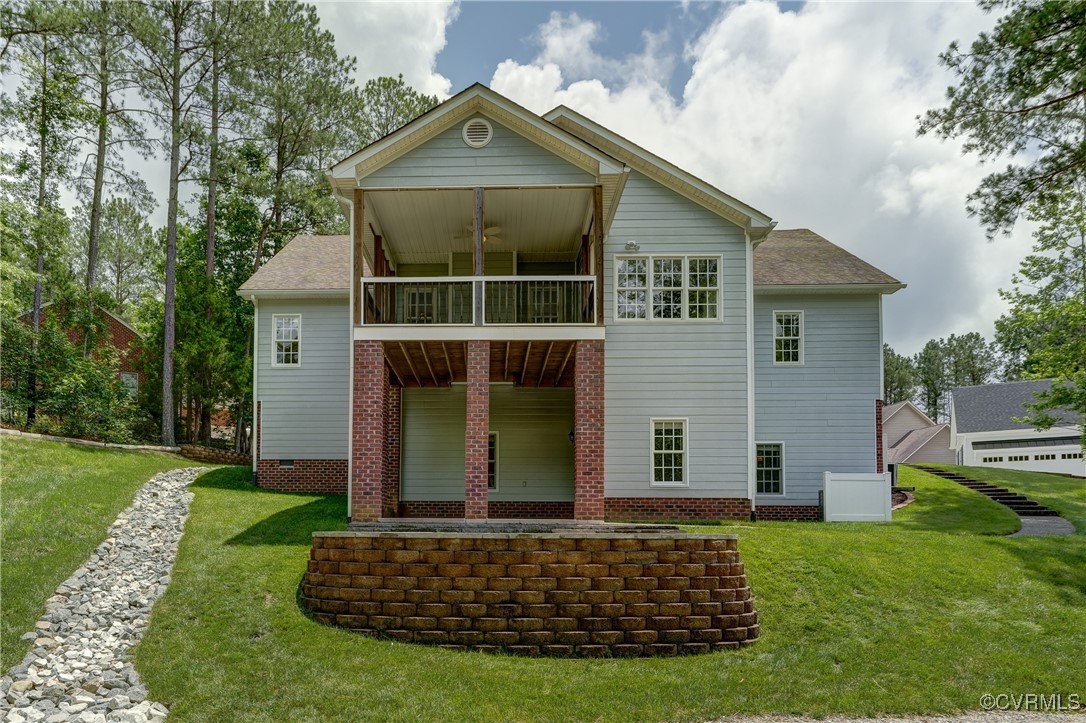 5501 Pine Needles Terrace Providence Forge, VA 23140 - Photo 42 of 50 a front view of a house with a yard