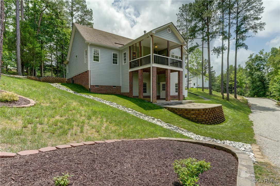 5501 Pine Needles Terrace Providence Forge, VA 23140 - Photo 43 of 50 a view of a house with backyard and garden