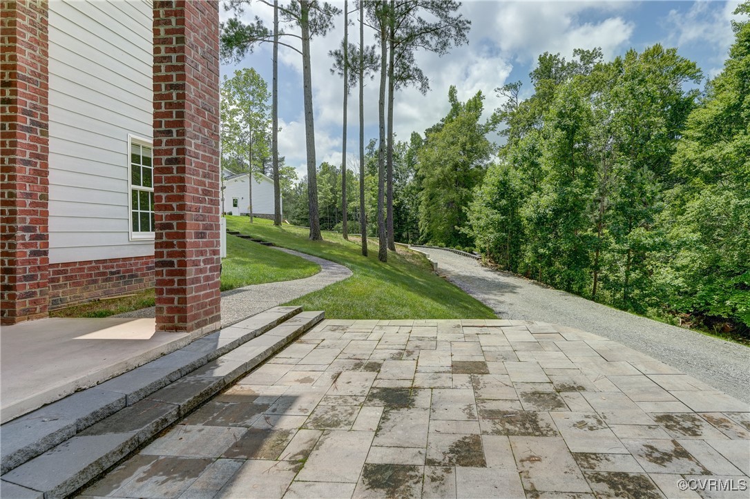 5501 Pine Needles Terrace Providence Forge, VA 23140 - Photo 48 of 50 a view of a pathway with a yard