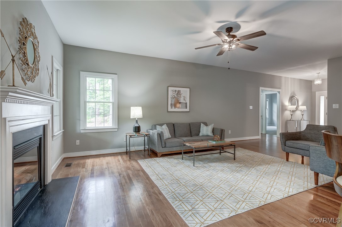 5501 Pine Needles Terrace Providence Forge, VA 23140 - Photo 7 of 50 a living room with furniture and a fireplace