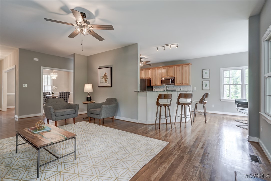 5501 Pine Needles Terrace Providence Forge, VA 23140 - Photo 10 of 50 a living room with furniture a dining table and kitchen view