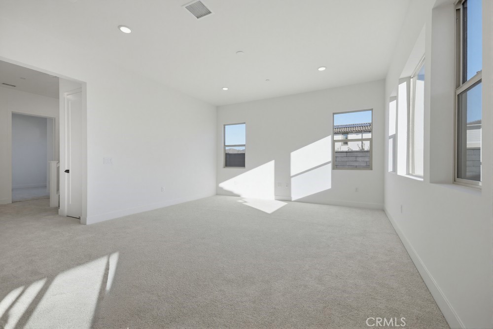 452 Botanica Rancho Mission Viejo, CA 92694 - Photo 13 of 53 a view of a kitchen with furniture and a refrigerator