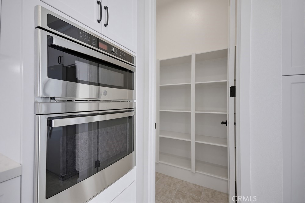 452 Botanica Rancho Mission Viejo, CA 92694 - Photo 22 of 53 a stove top oven sitting inside of a kitchen