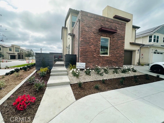 452 Botanica Rancho Mission Viejo, CA 92694 - Photo 39 of 53 a front view of a house with yard