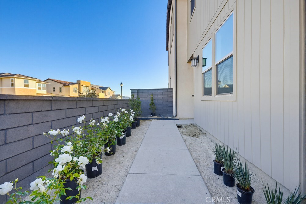 452 Botanica Rancho Mission Viejo, CA 92694 - Photo 4 of 53 a view of a pathway along a building