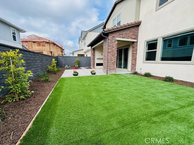 452 Botanica Rancho Mission Viejo, CA 92694 - Photo 50 of 53 a view of a house with a yard and sitting area