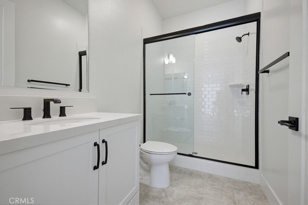 452 Botanica Rancho Mission Viejo, CA 92694 - Photo 9 of 53 a bathroom with a sink a toilet and shower