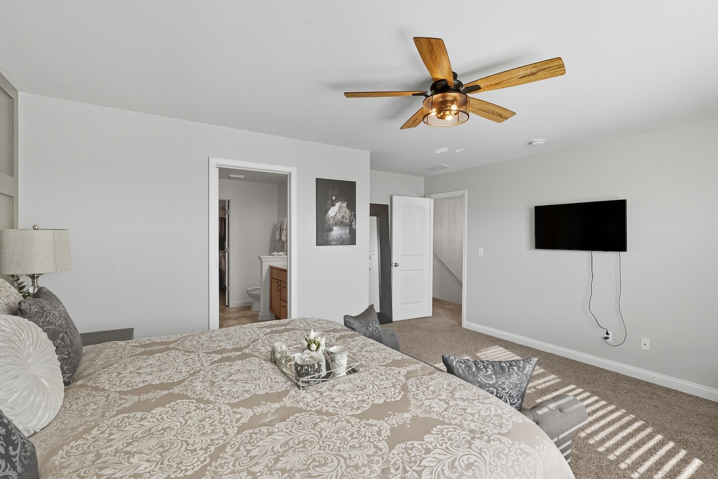 3353 Field Hawk Drive Valparaiso, IN 46383 - Photo 17 of 33 a bedroom with a bed and a flat screen tv