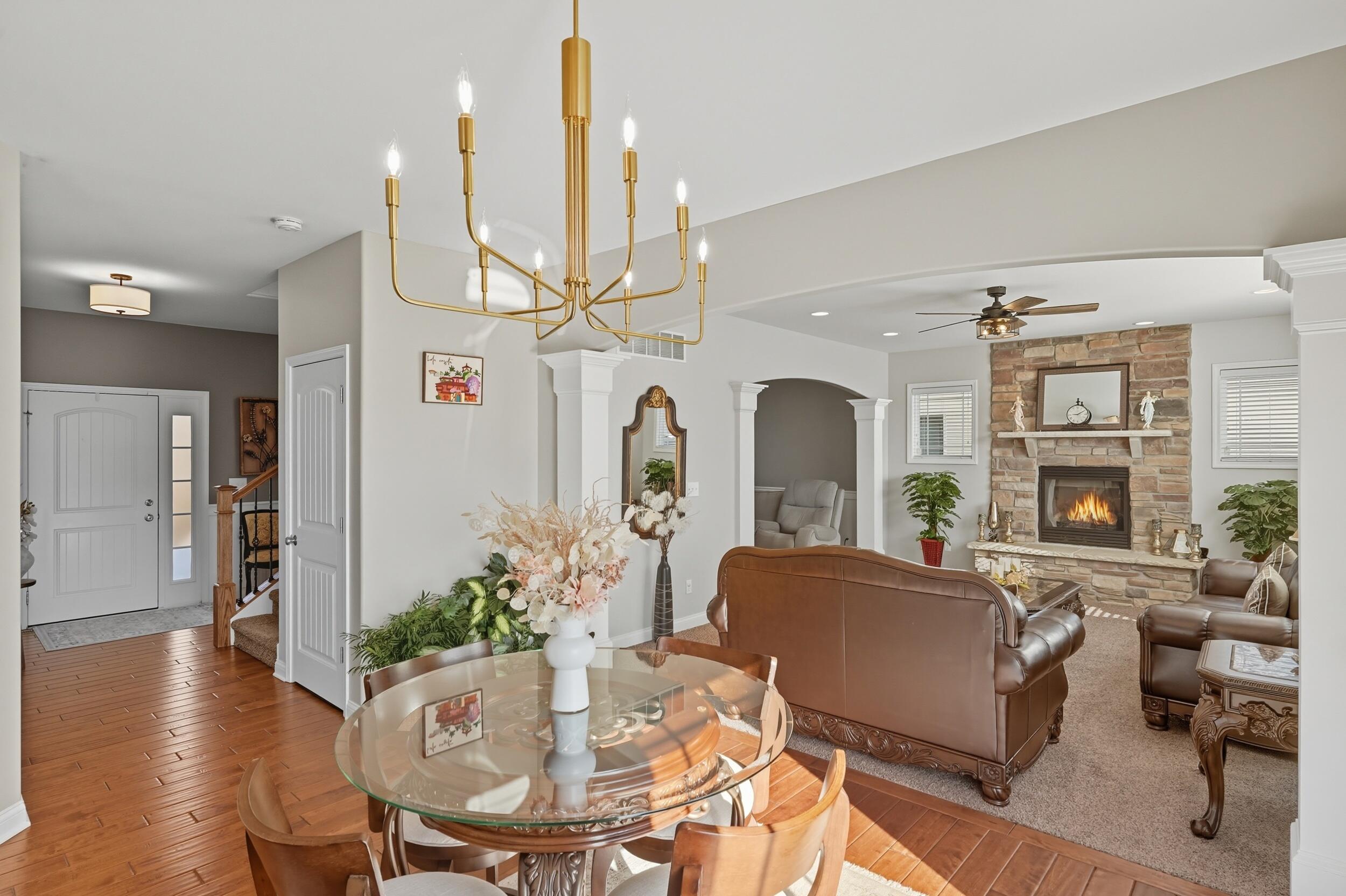 3353 Field Hawk Drive Valparaiso, IN 46383 - Photo 2 of 33 a view of a dining room with furniture window and wooden floor