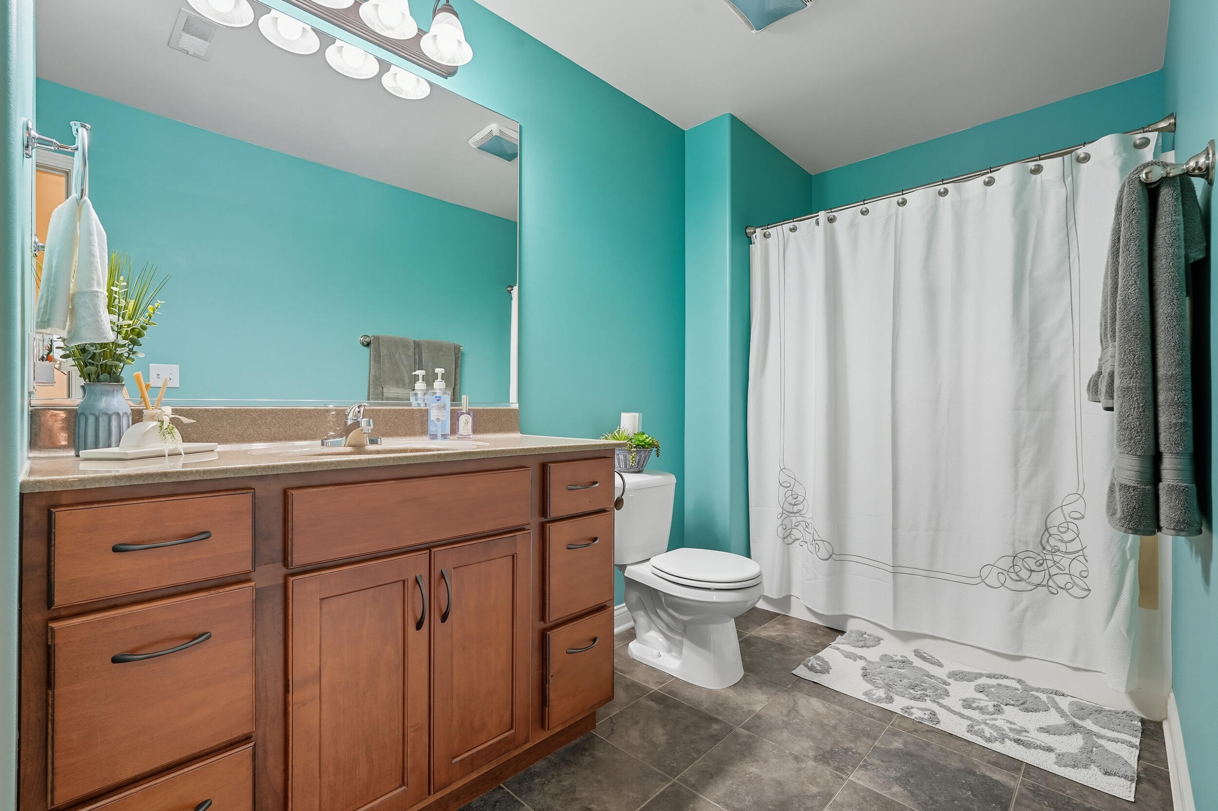 3353 Field Hawk Drive Valparaiso, IN 46383 - Photo 23 of 33 a bathroom with a toilet a sink and a mirror