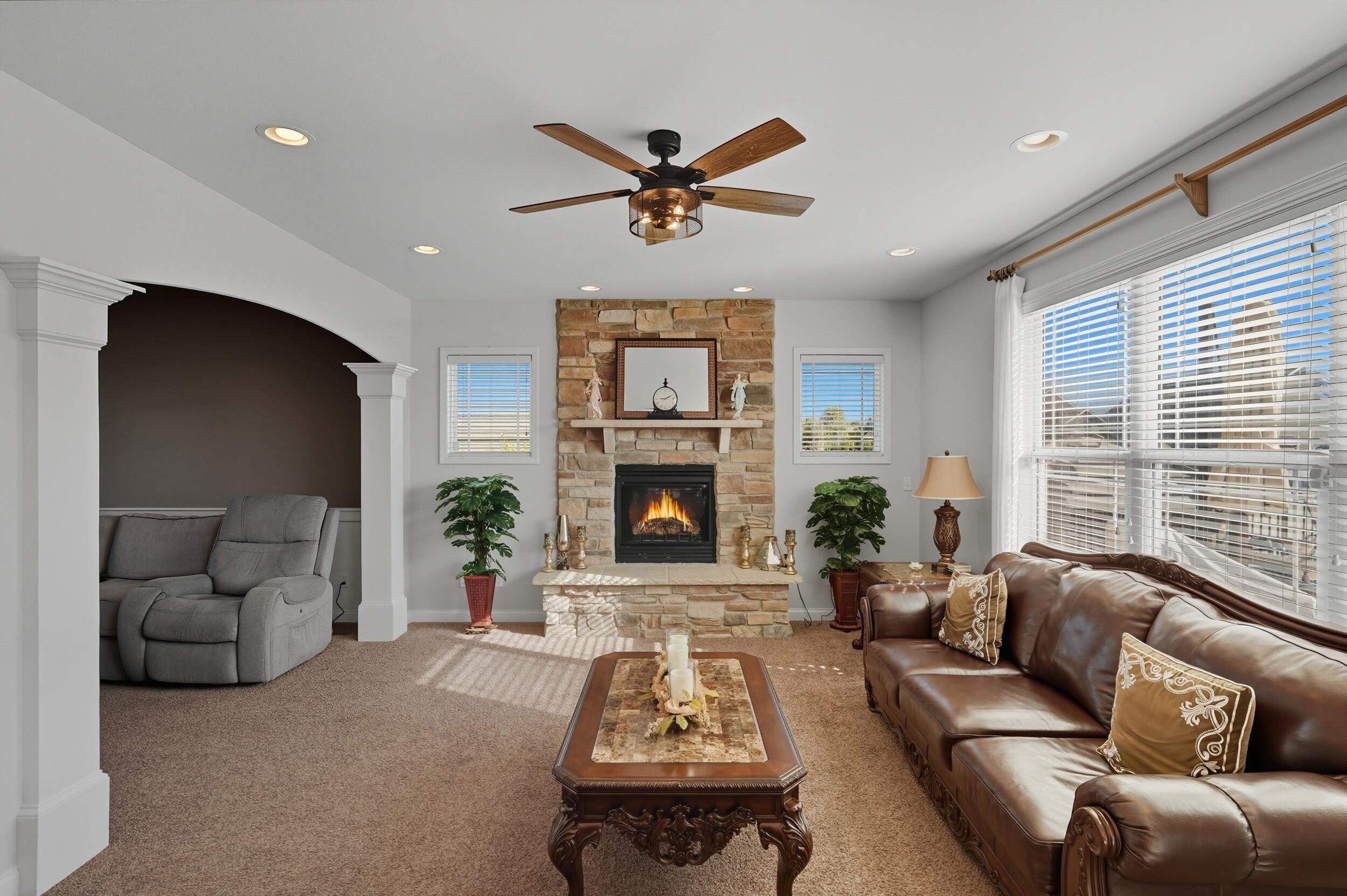 3353 Field Hawk Drive Valparaiso, IN 46383 - Photo 3 of 33 a living room with furniture and a fireplace