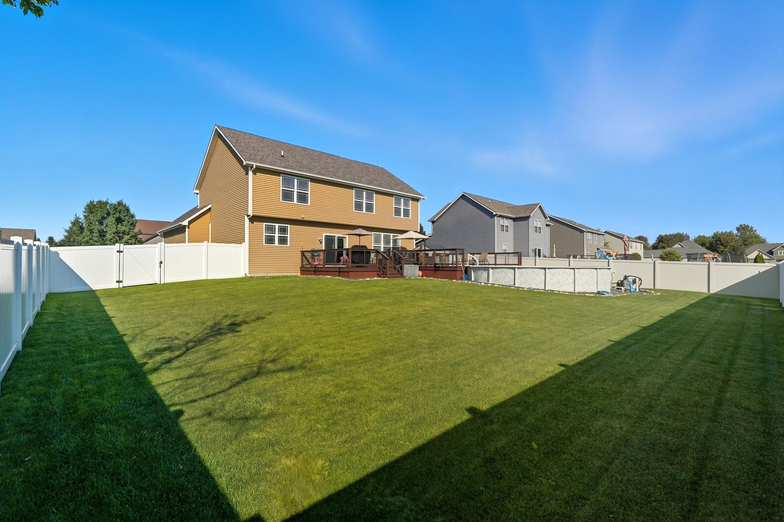 3353 Field Hawk Drive Valparaiso, IN 46383 - Photo 31 of 33 a view of a big house with a big yard and large trees