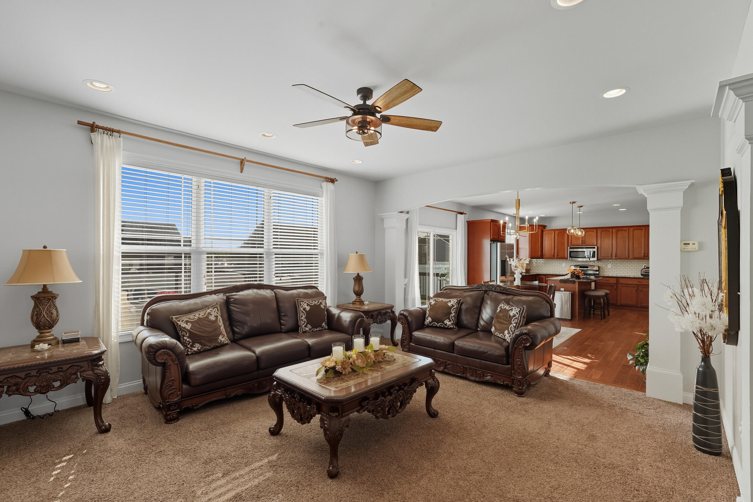 3353 Field Hawk Drive Valparaiso, IN 46383 - Photo 5 of 33 a living room with furniture ceiling fan and a window
