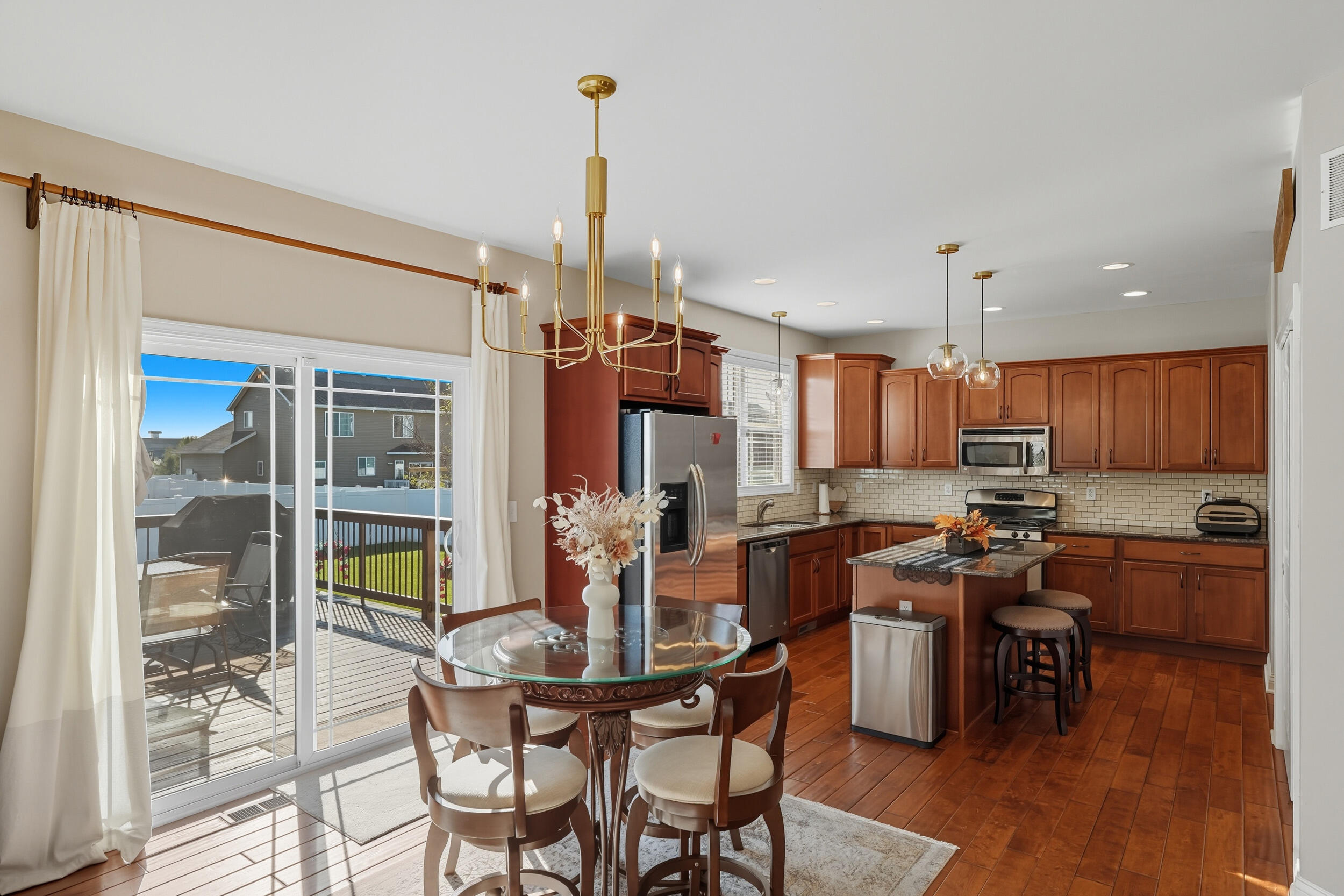 3353 Field Hawk Drive Valparaiso, IN 46383 - Photo 7 of 33 a kitchen with lots of counter top space and stainless steel appliances