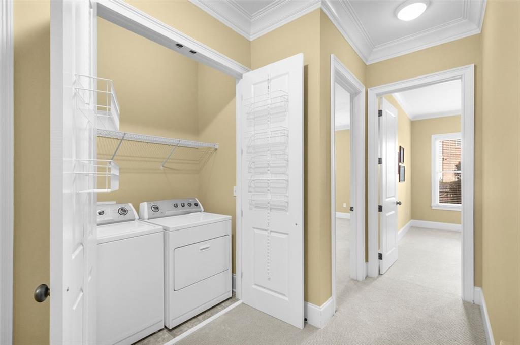 3635 East Paces Circle, Unit 1103 Atlanta, GA 30326 - Photo 26 of 37 a view of utility room with washer and dryer